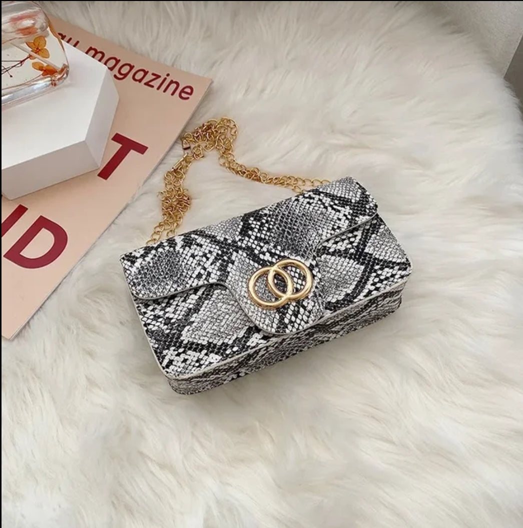 Trendy snakeskin pattern bag