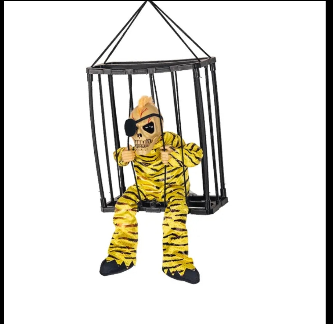 Scary screaming Halloween decor in cage