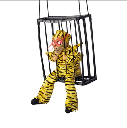 Scary screaming Halloween decor in cage